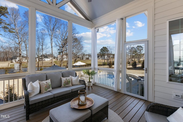 sunroom with vaulted ceiling