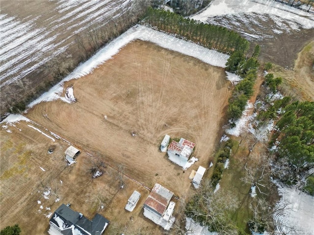 birds eye view of property with a rural view