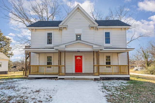 view of front of house featuring a porch and roof with shingles