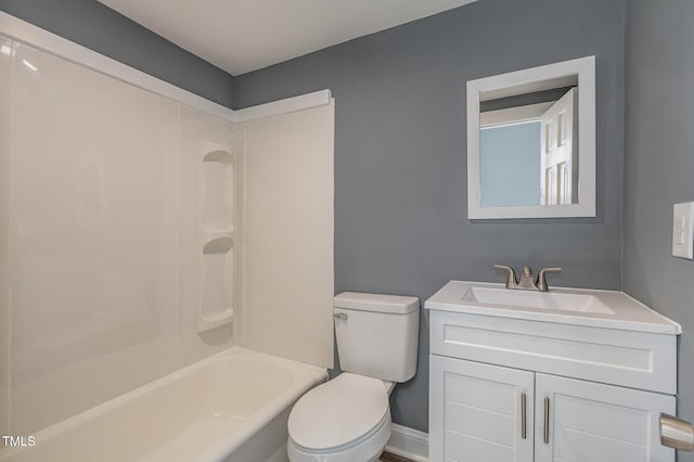 bathroom featuring shower / bathtub combination, vanity, toilet, and baseboards