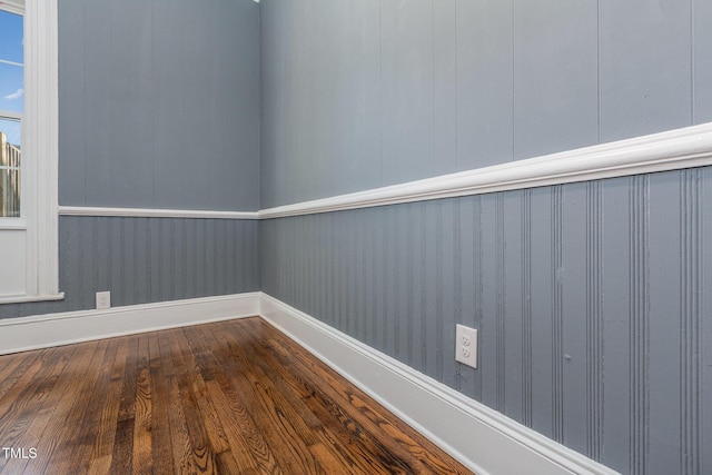 empty room with wood-type flooring