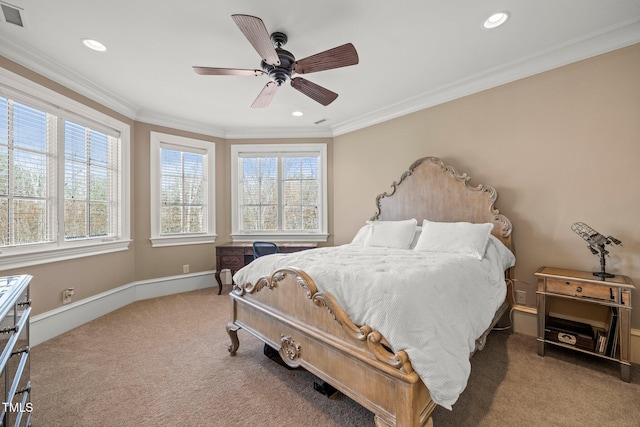 bedroom with crown molding, carpet floors, and ceiling fan