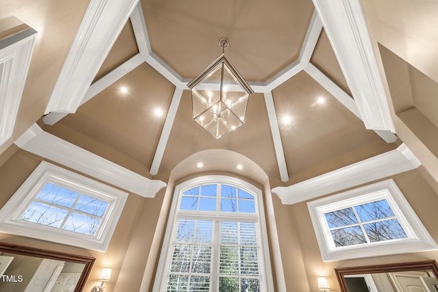 interior details featuring a chandelier