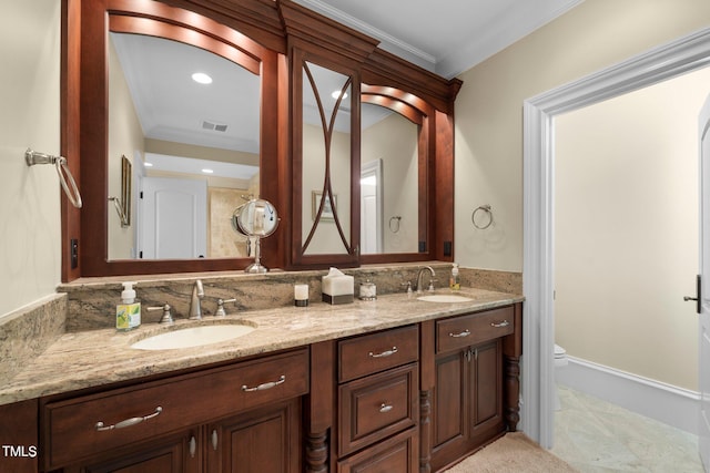 bathroom featuring crown molding, tile patterned floors, vanity, and toilet