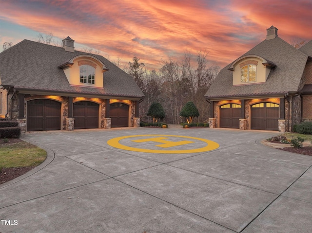 view of front of property with a garage