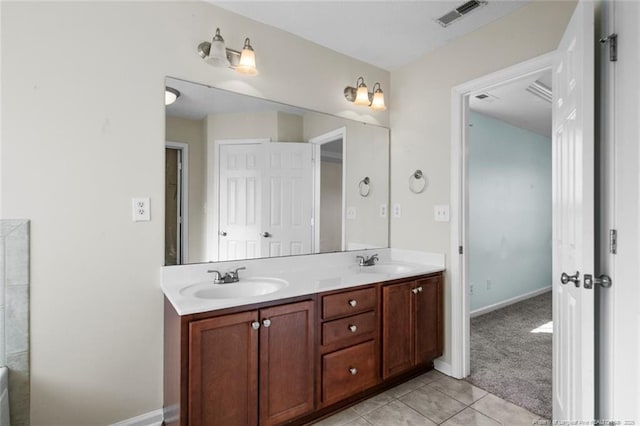 bathroom featuring tile patterned floors and vanity