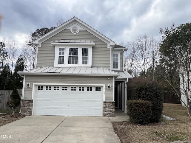 view of front of property with a garage