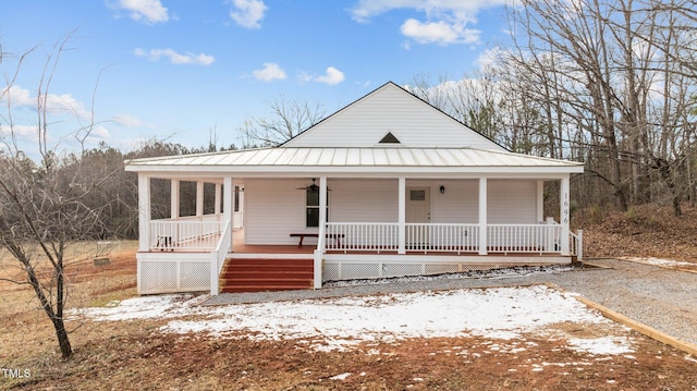 country-style home with a porch