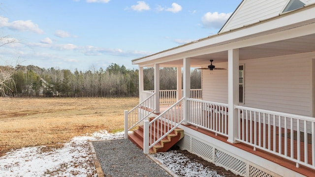 exterior space with ceiling fan