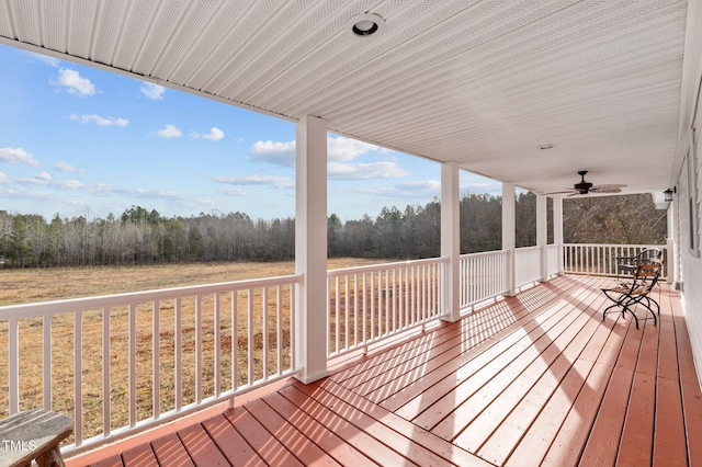 wooden deck with ceiling fan