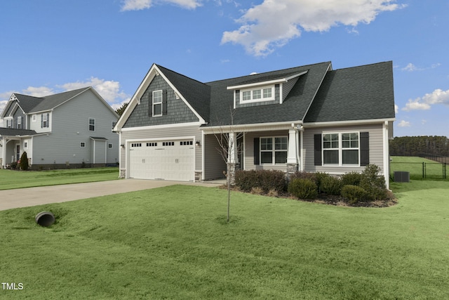 view of front facade featuring a garage and a front yard