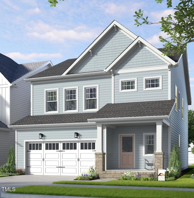 craftsman inspired home with concrete driveway, covered porch, a garage, and roof with shingles