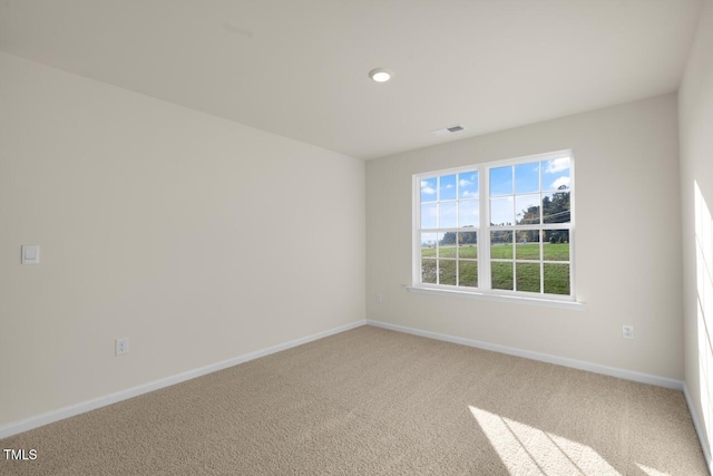 empty room with carpet flooring