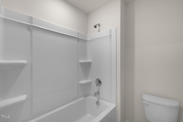 bathroom with toilet and shower / bath combination