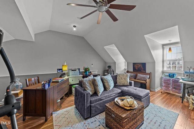 living room with vaulted ceiling, light hardwood / wood-style floors, and ceiling fan