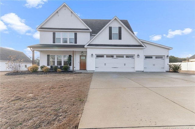 view of front of home featuring a garage and covered porch