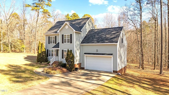 view of front facade featuring a garage and a front lawn