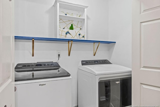 laundry area with separate washer and dryer