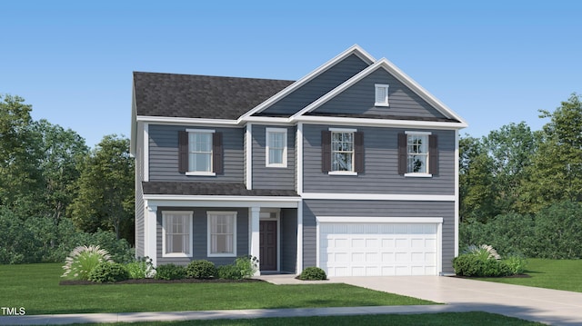 view of front of property with a garage and a front yard