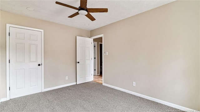 unfurnished bedroom with carpet and ceiling fan