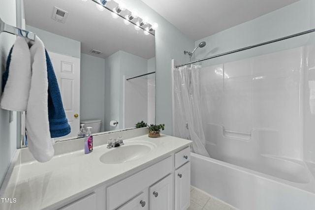 full bathroom featuring shower / bath combination with curtain, vanity, toilet, and tile patterned flooring