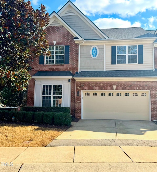 view of front of property with a garage