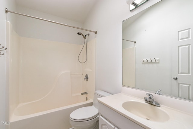 full bathroom with tub / shower combination, vanity, and toilet