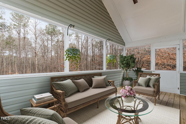 sunroom / solarium with vaulted ceiling