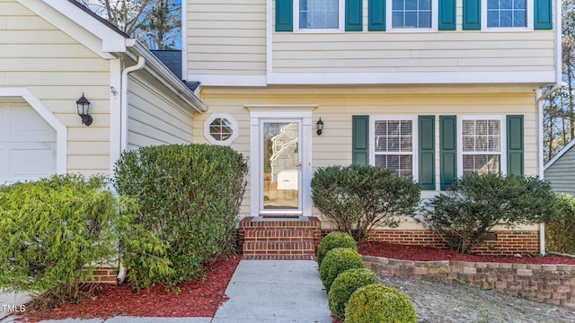 property entrance featuring a garage