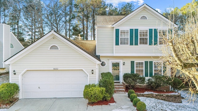 front of property featuring a garage