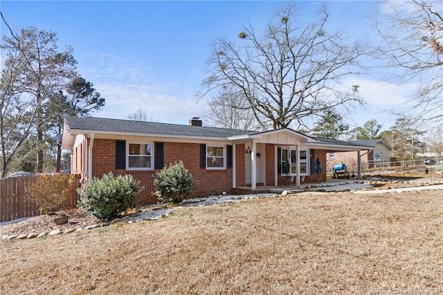 view of front of property with a front yard and a porch