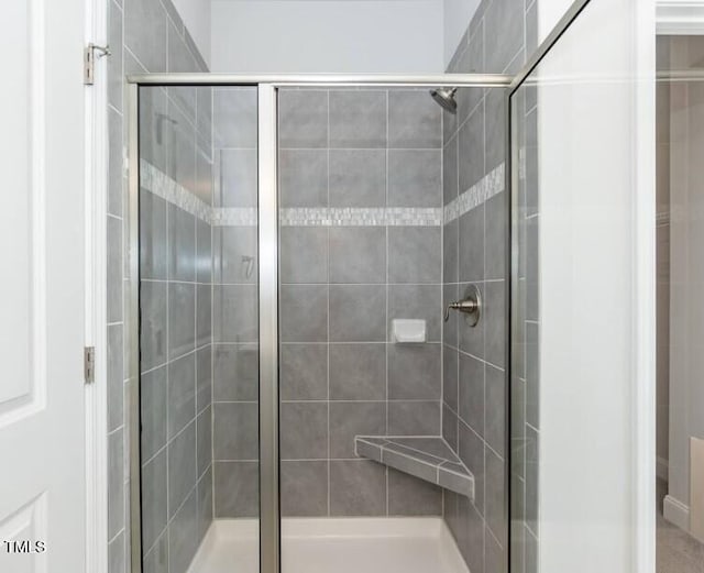 bathroom with an enclosed shower