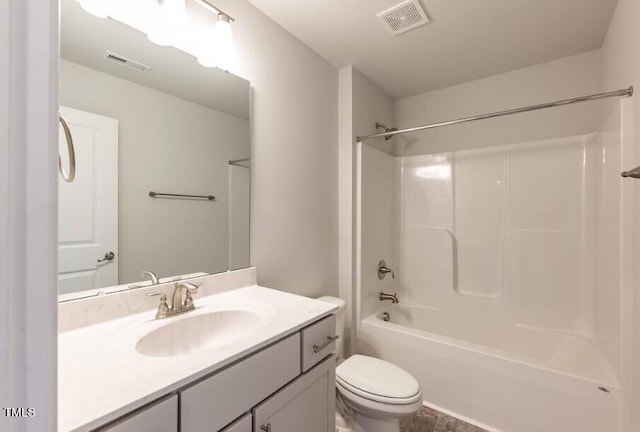 full bathroom featuring vanity, shower / bathing tub combination, and toilet