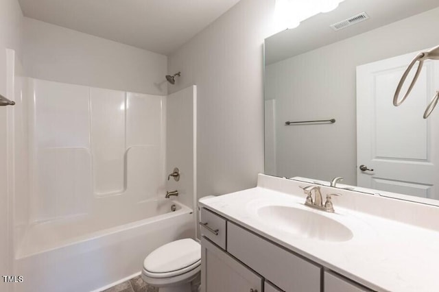 full bathroom with vanity, tub / shower combination, and toilet