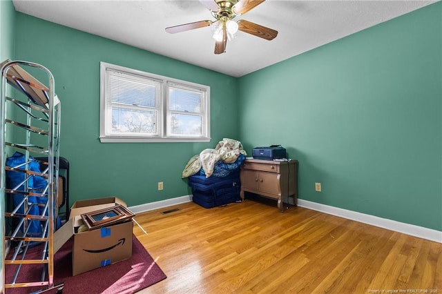 interior space featuring ceiling fan and light hardwood / wood-style flooring