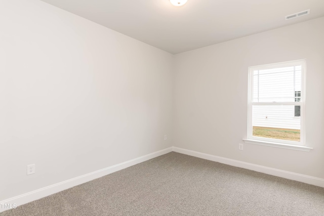 empty room featuring carpet floors