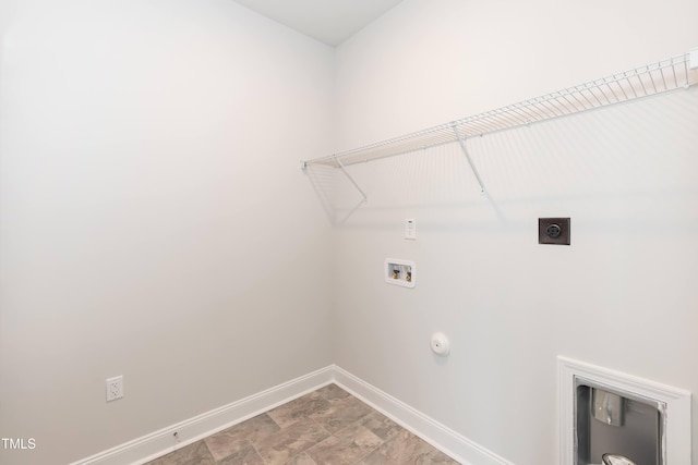 laundry area with hookup for a washing machine, gas dryer hookup, and hookup for an electric dryer