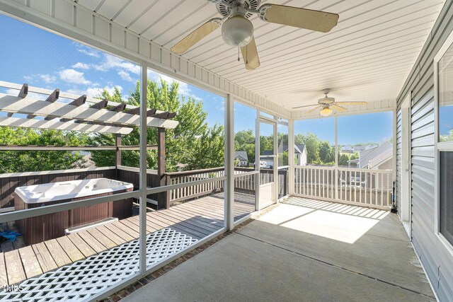 2228 Lakedale Dr, Fayetteville, NC 28306 - unfurnished sunroom with a jacuzzi and a ceiling fan
