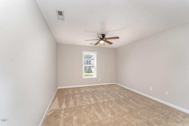 2228 Lakedale Dr, Fayetteville, NC 28306 - unfurnished room with a ceiling fan, light colored carpet, and baseboards