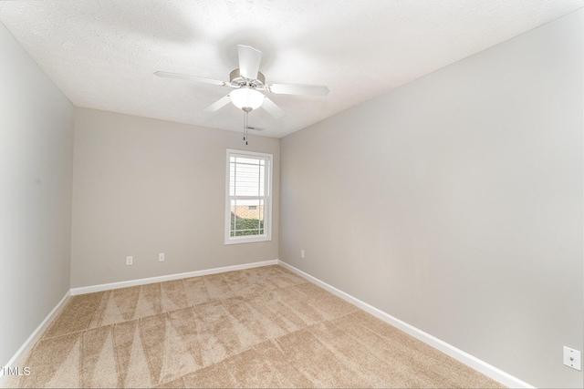 2228 Lakedale Dr, Fayetteville, NC 28306 - empty room with carpet flooring, baseboards, and a ceiling fan