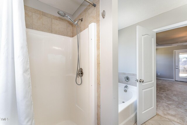 2228 Lakedale Dr, Fayetteville, NC 28306 - full bathroom with a shower with curtain, a tub to relax in, and tile patterned flooring