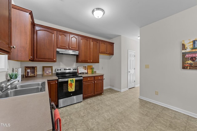 kitchen with stainless steel range with electric stovetop and sink