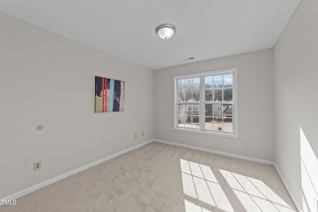 view of carpeted spare room