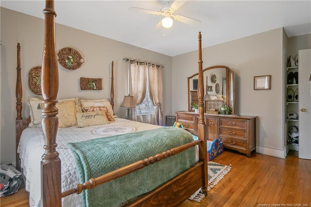 bedroom featuring ceiling fan and light wood-type flooring