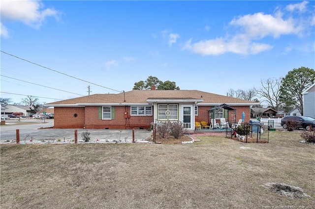 exterior space with a front yard