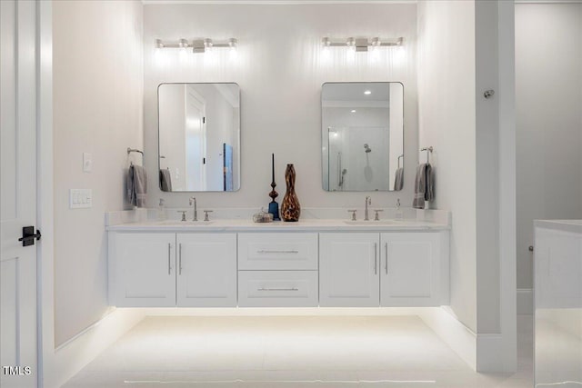 bathroom with a shower and vanity