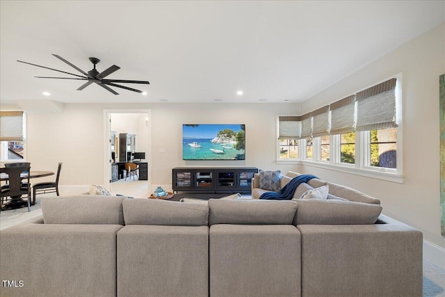 living room featuring ceiling fan