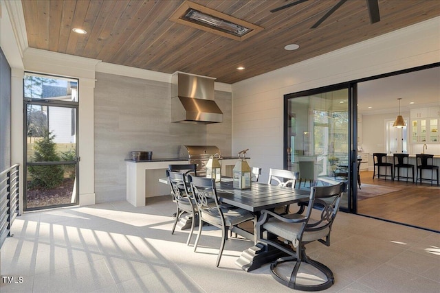 dining area with ornamental molding and wooden ceiling