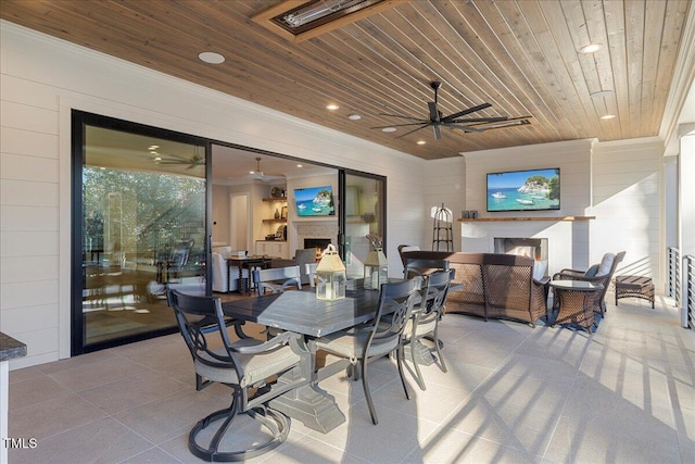 view of patio featuring an outdoor living space and ceiling fan