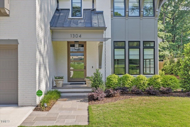 1304 Ivy Ln, Raleigh, NC 27609 - entrance to property with a lawn and brick siding
